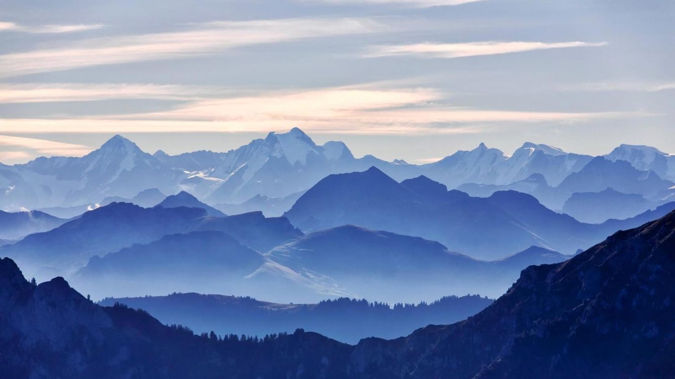 snow covered mountains during daytime