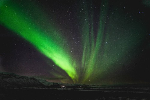 Image green aurora lights during night time