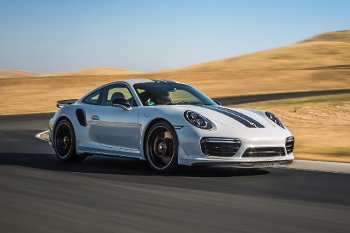 Image white porsche 911 on road during daytime