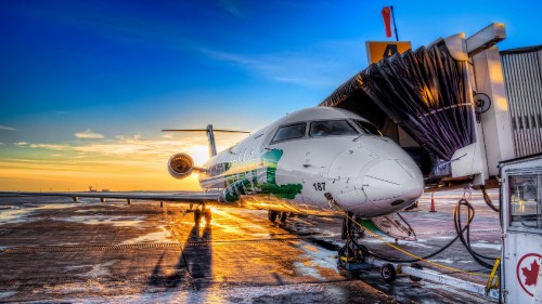 Image white airplane on airport during daytime