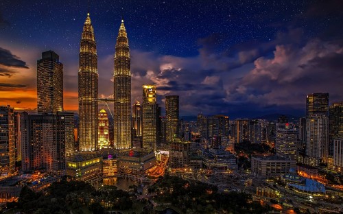 Image high rise building during night time