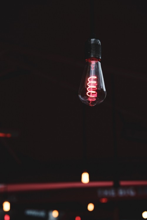 Image red and white light bulb