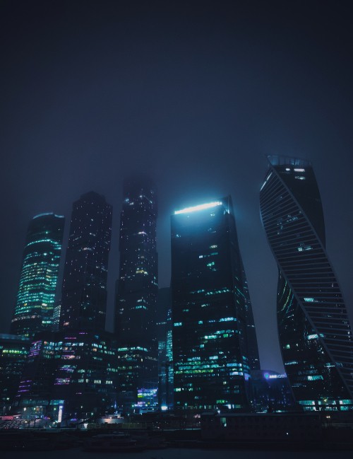 Image high rise buildings during night time