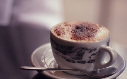 Image white ceramic cup with saucer