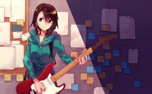 Image woman in blue and black jacket holding electric guitar