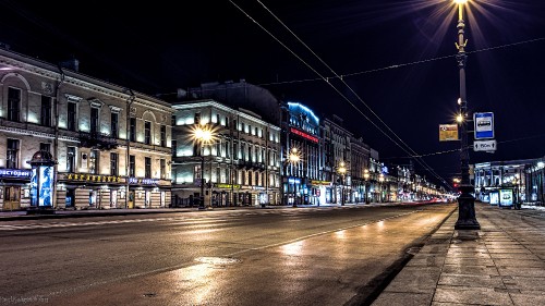 Image city buildings with lights turned on during night time