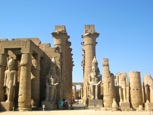 Image people walking on gray concrete blocks during daytime