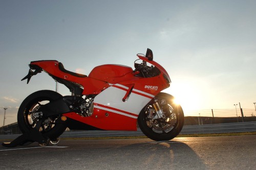 Image red and black sports bike on road during daytime