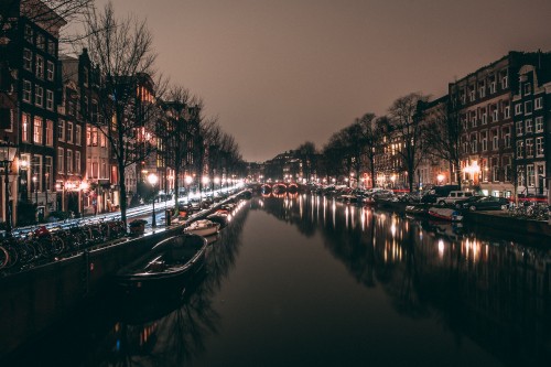 Image boat on river during night time