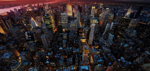 Image aerial view of city buildings during night time