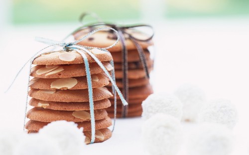 Image brown and white cookies on white table