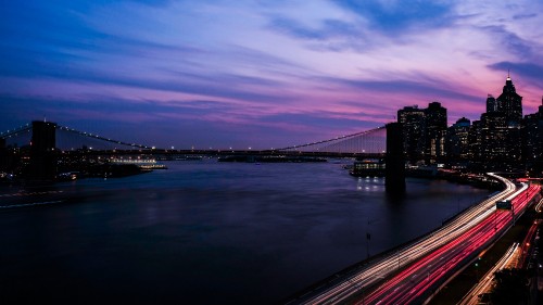 Image bridge over water during sunset