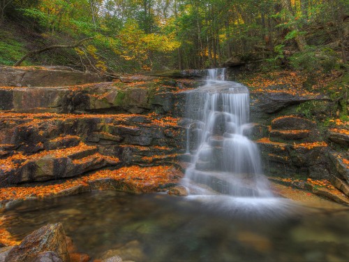 Image water falls in the middle of the forest