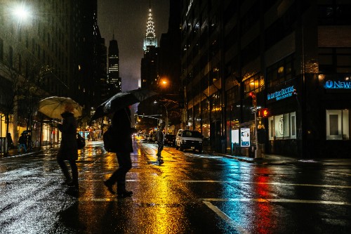 Image people walking on pedestrian lane during night time