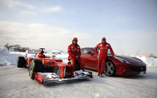 Image 3 men in red car on snow covered ground during daytime