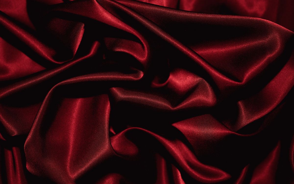 red textile in close up photography