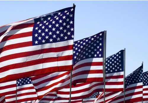 Image us a flag under blue sky during daytime