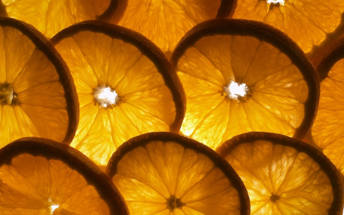 Orangenfrucht Mit Lila Blüte. Wallpaper in 2560x1600 Resolution