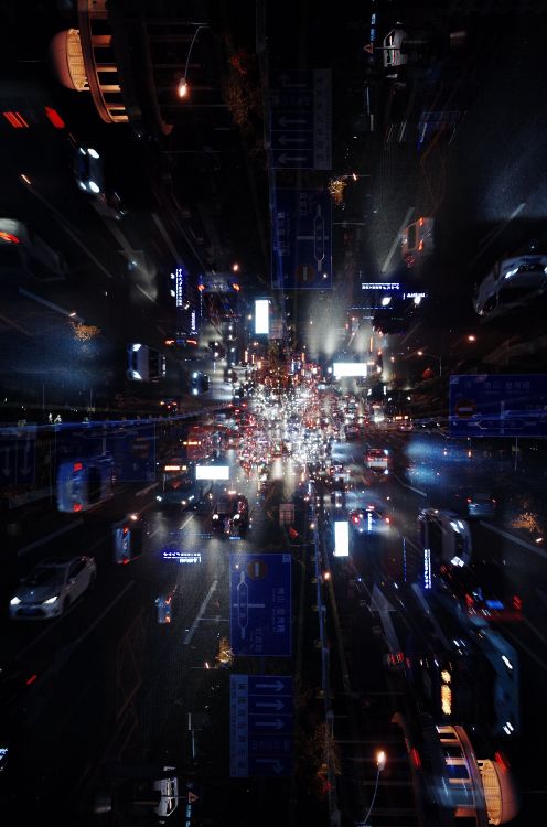 Weiße Und Blaue Lichterketten Auf Der Straße Während Der Nacht. Wallpaper in 3264x4928 Resolution