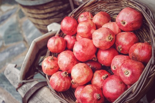 Image red apples on brown wooden crate