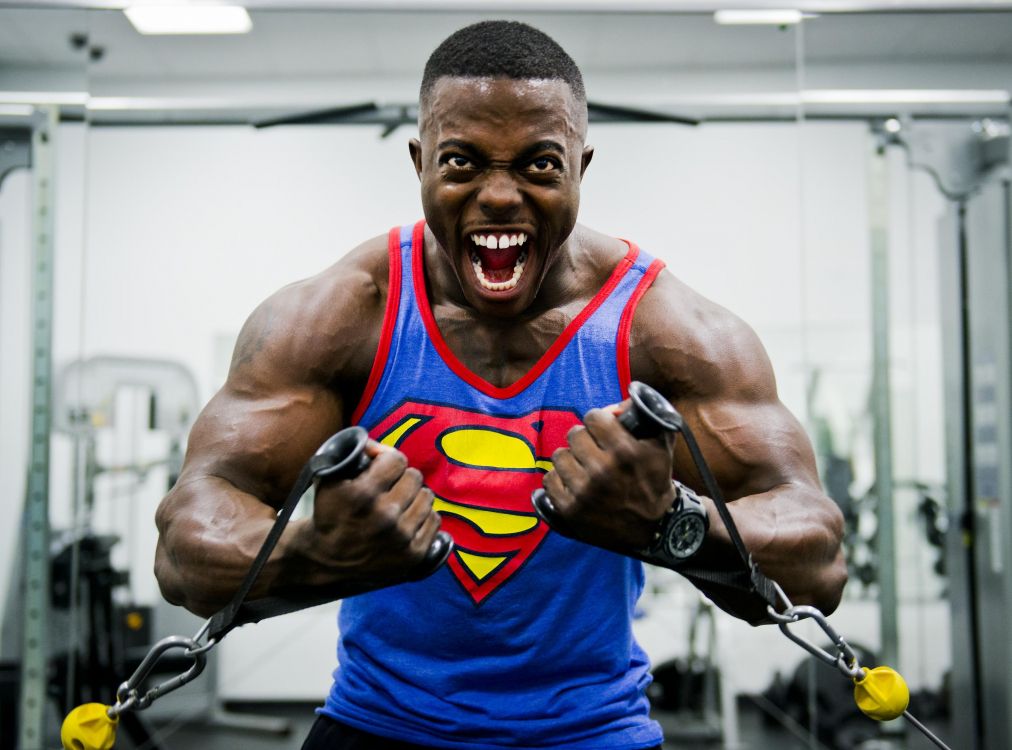 man in blue and yellow nike tank top