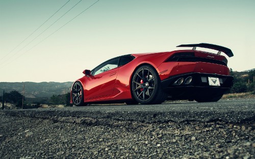 Image red ferrari 458 italia on gray concrete road