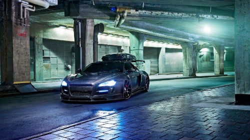 Image black porsche 911 parked in building