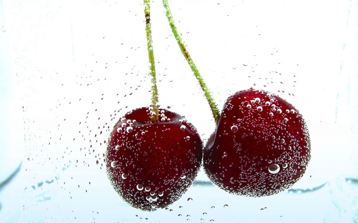 red cherry fruit on white background