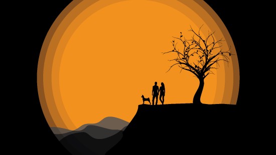 Image silhouette of 2 people standing on rock formation during sunset