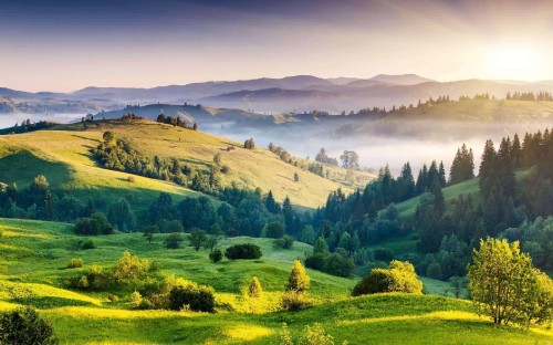 Image green grass field and mountains during daytime