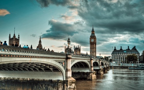 Image brown concrete bridge over river during daytime