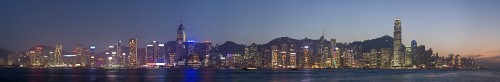 Image city skyline near body of water during night time