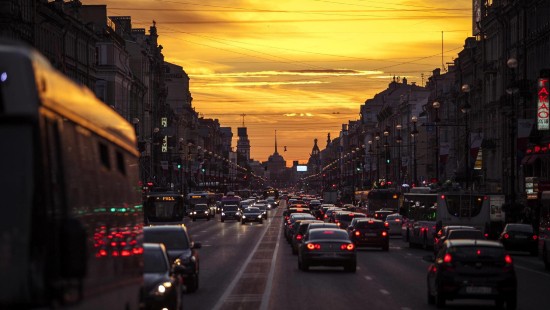 Image cars on road during sunset