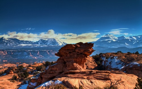 Image brown rocky mountain under blue sky during daytime