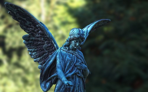 Image angel statue in close up photography