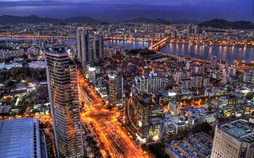 Image aerial view of city buildings during night time