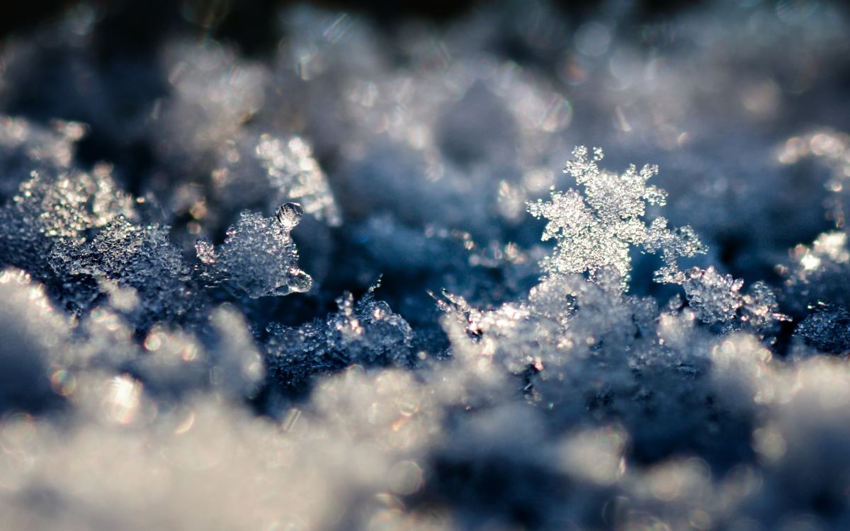 white snow on blue background