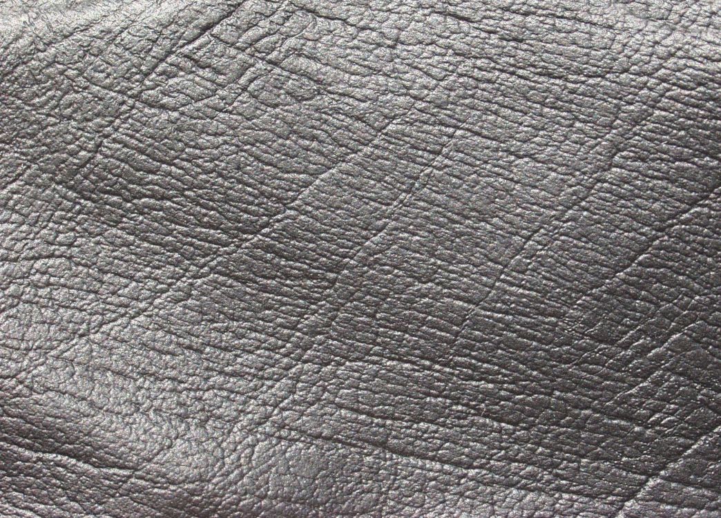 black leather textile in close up photography