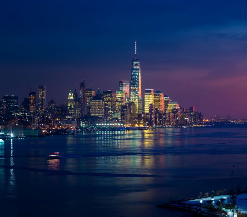 city skyline during night time