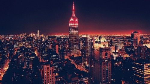 Image aerial view of city buildings during night time