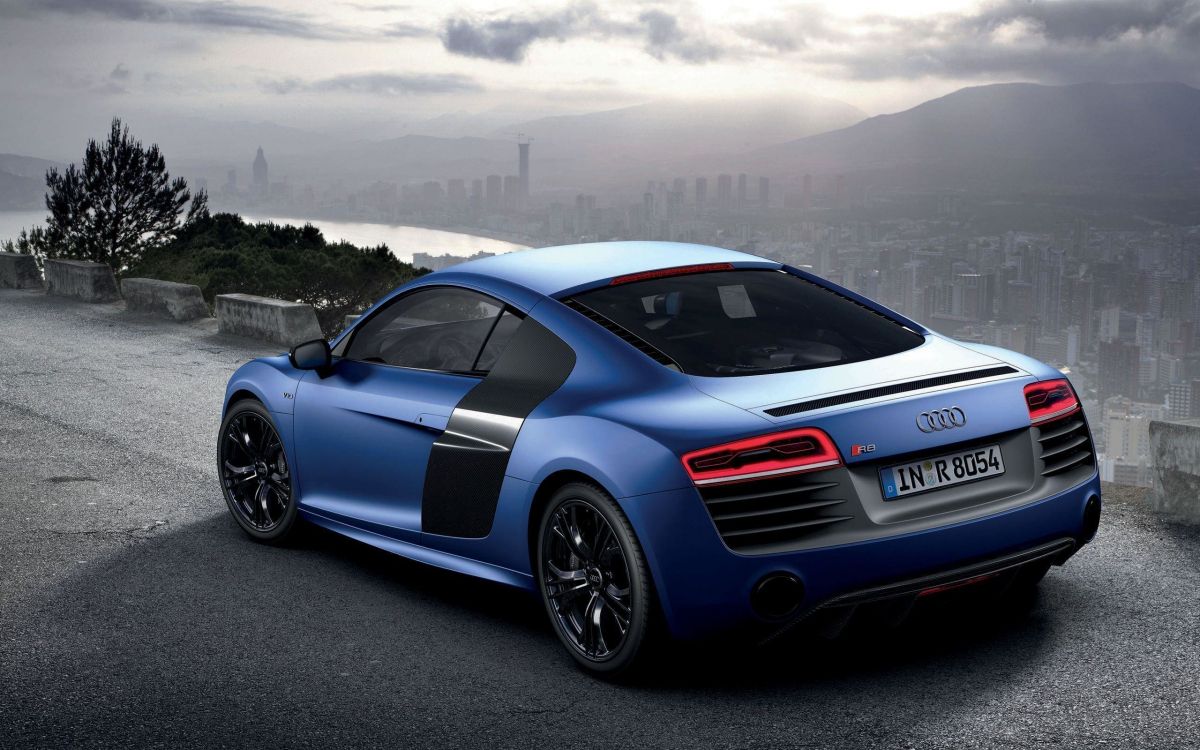 blue audi r 8 on road