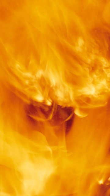 Image yellow smoke in close up photography