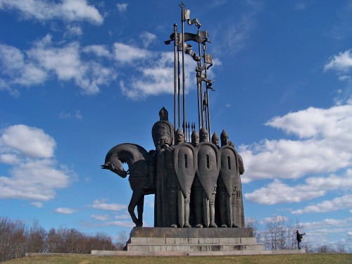 Image man riding horse statue under blue sky during daytime