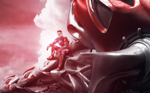 Image man in red suit sitting on rock
