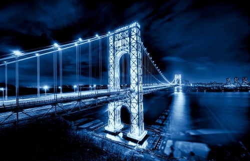 Image grayscale photo of bridge under cloudy sky