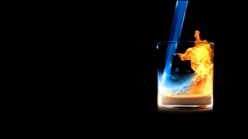 Image fire in clear drinking glass