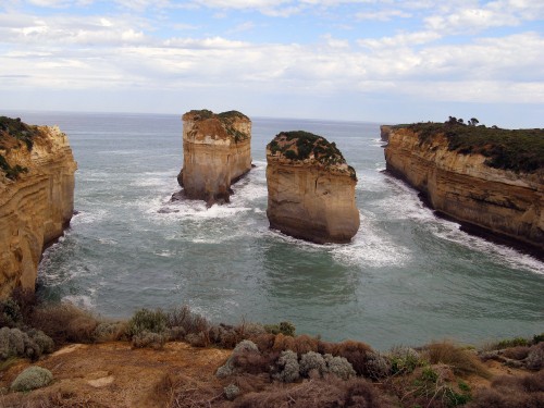 Image brown rock formation on sea during daytime