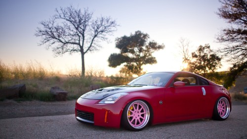 Image red ferrari 458 italia on road during daytime