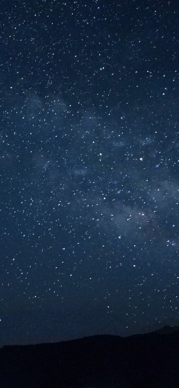Image silhouette of mountain under starry night