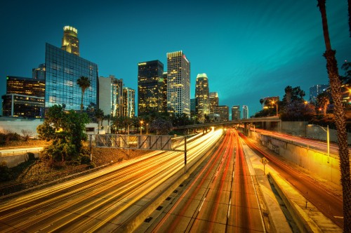 Image time lapse photography of city during night time